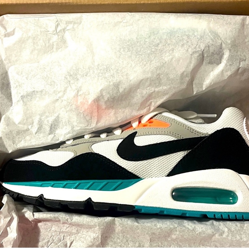 Nike Women's Sneakers in White, Black, and Teal with Orange Highlights